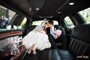 Atlanta Wedding Transportation: Bride and Groom in Luxury Limousine